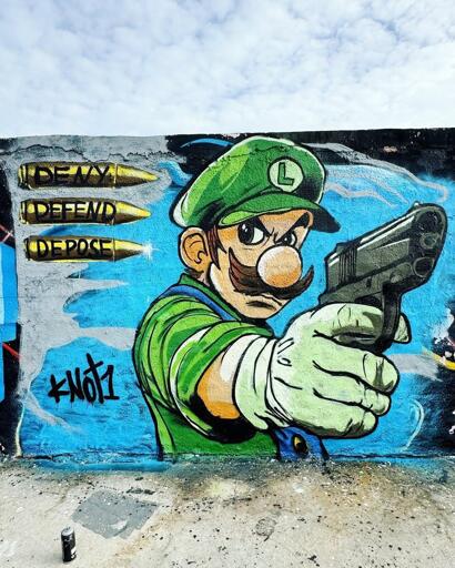 A bright spray-paint mural of a determined Luigi the Plumber aiming a pistol. In the corner are three shiny golden bullets, each with "Deny", "Defend" and "Depose" written on them.